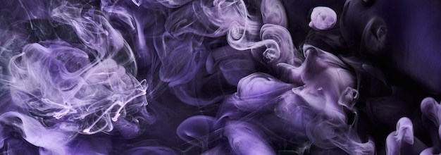 Purple lilac multicolored smoke abstract background acrylic paint underwater explosion