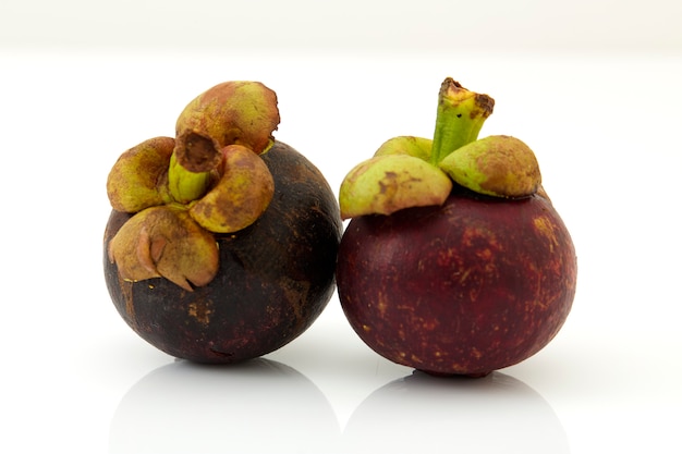 The purple mangosteen on white