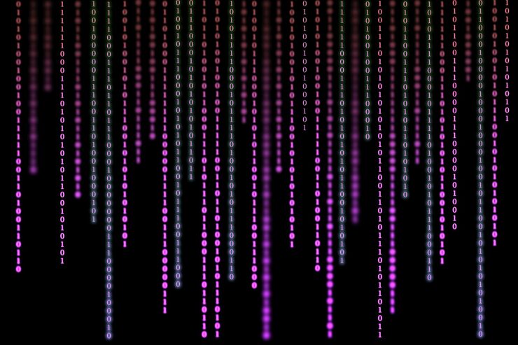 Photo purple matrix background of binary numbers matrix of computer data vertical digital binary code moves down black background space with layered coding