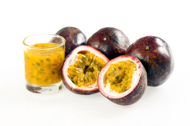 Purple passion fruit on white background