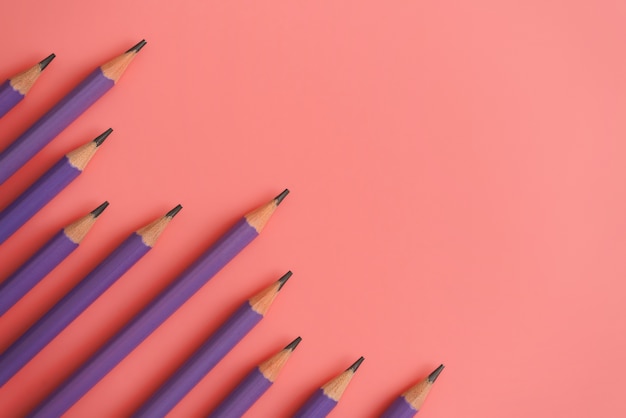 purple pencils on pink background