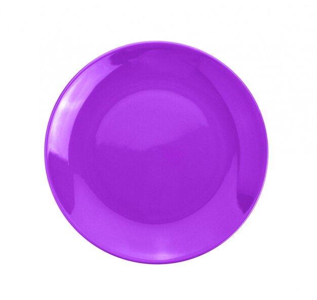 Purple plate on white surface. top view