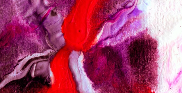 a purple and red colored material with a purple background