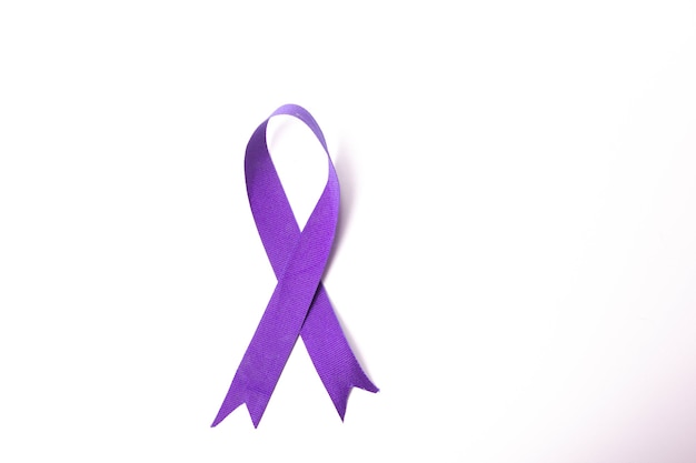 Photo purple ribbon  a symbol of the problem of lupus alzheimers disease sarcoidosis