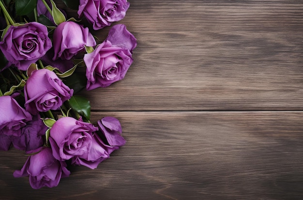 Purple rose composition on wooden tabletop