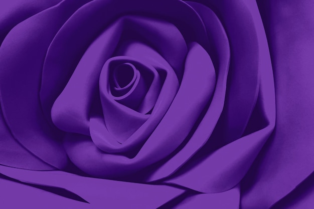 Purple rose textured background handmade artificial flower closeup