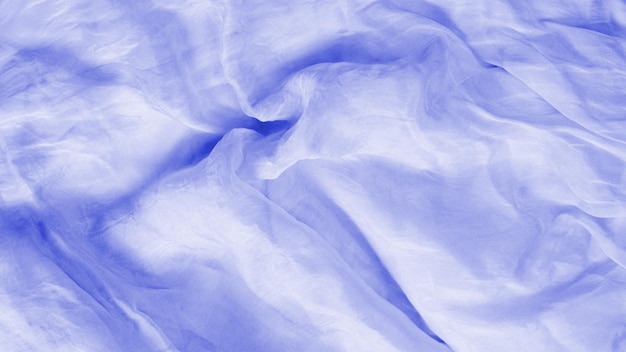 Purple silk or satin luxury fabric texture can use as abstract background top view