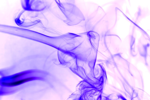 Purple smoke on a white background.