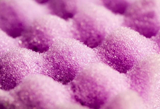 Purple sponges for washing dishes and other items, close-up of kitchen sponges