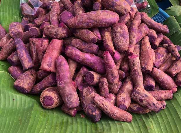 Photo purple sweet potato boild serve for sale in market