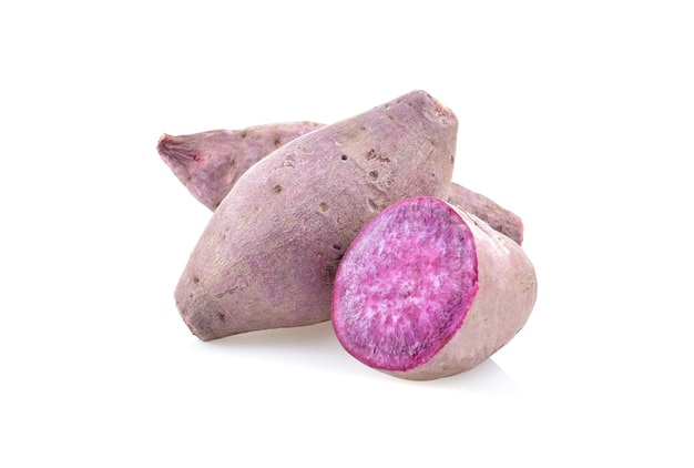 Photo purple sweet potatoes on white background