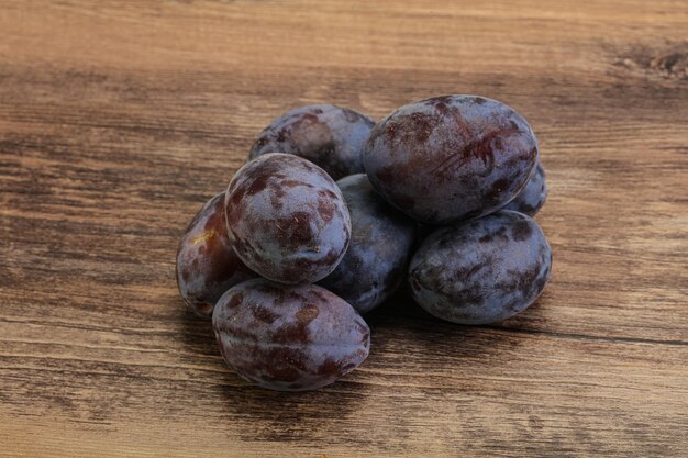 Purple sweet ripe tasty plum heap