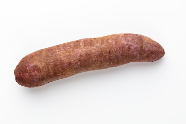 Purple ube yams on isolated white background