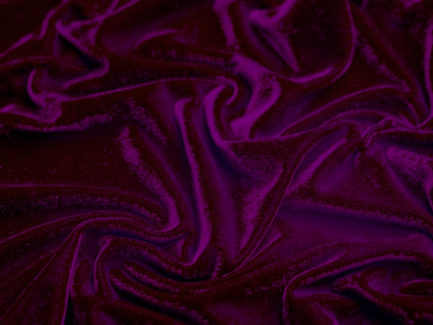 Текстура фиолетовой бархатной ткани, используемая в качестве фона. Пустой фиолетовый фон ткани из мягкого и гладкого текстильного материала. Есть место для textxA