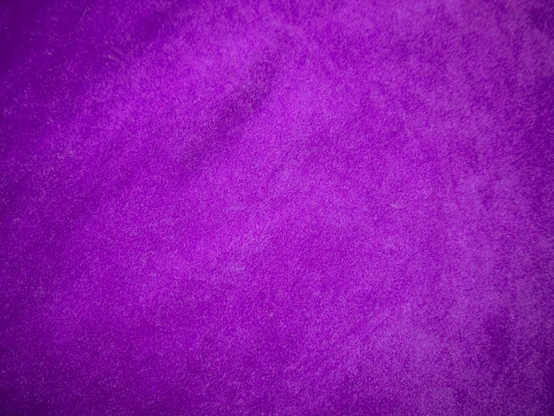 Purple velvet fabric texture used as background Luxury violet fabric background of soft and smooth textile material There is space for text