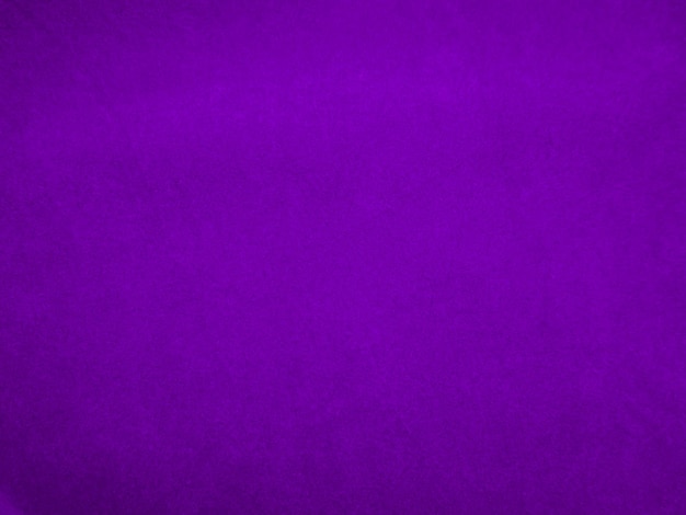 Фиолетовая бархатная текстура ткани, используемая в качестве фона