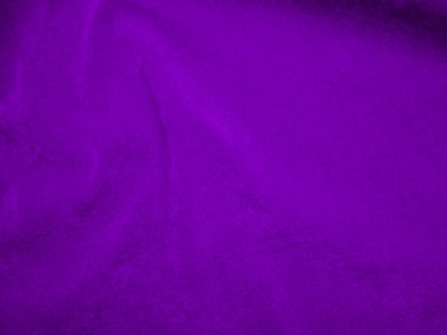 Фиолетовая бархатная текстура ткани, используемая в качестве фона