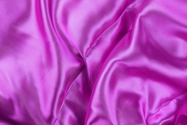 Purple wrinkled cloth background for design in your work concept