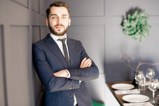 Purposeful handsome businessman in suit