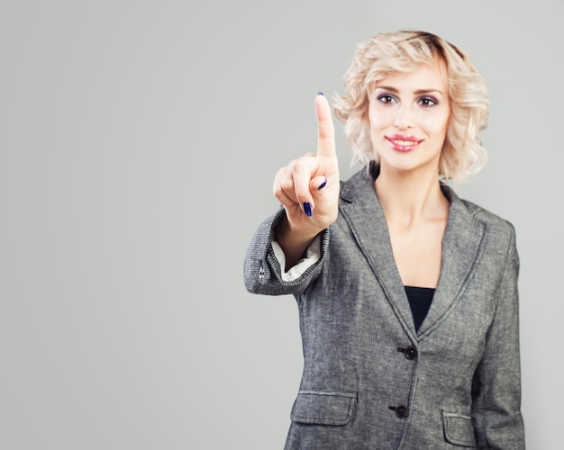 Push button Pointing businesswoman hand