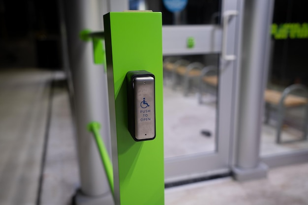 Push to open button for wheelchair users of the bus waiting pavilion