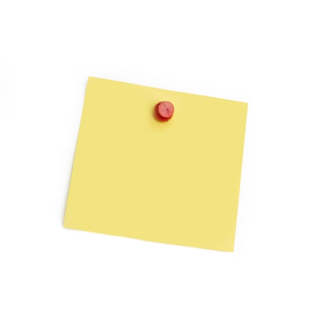 A push pin holding a yellow paper note on a white background