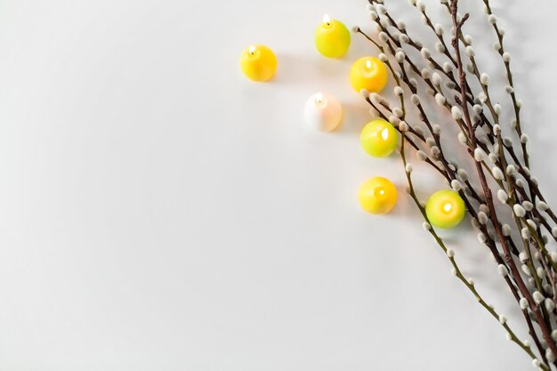 pussy willow branches and easter egg candles