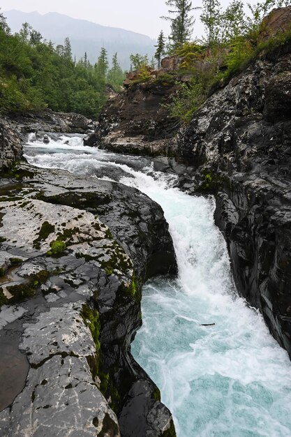 Putorana Plateau a waterfall on the Grayling Stream