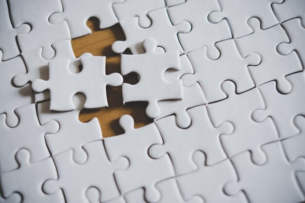 puzzle pieces on table, business and connection