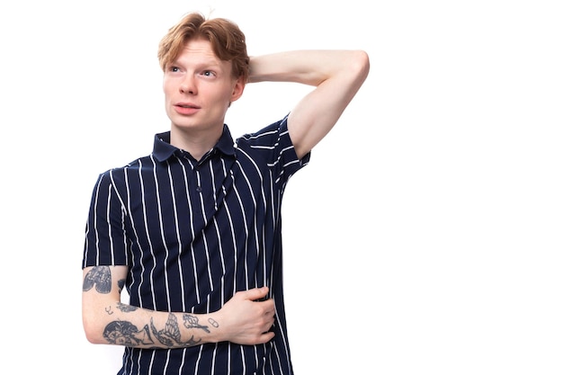 Puzzled stylish young whitehaired man