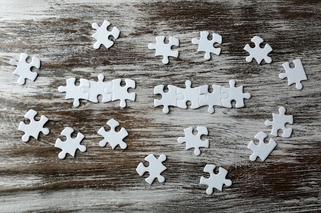 Puzzles on wooden table