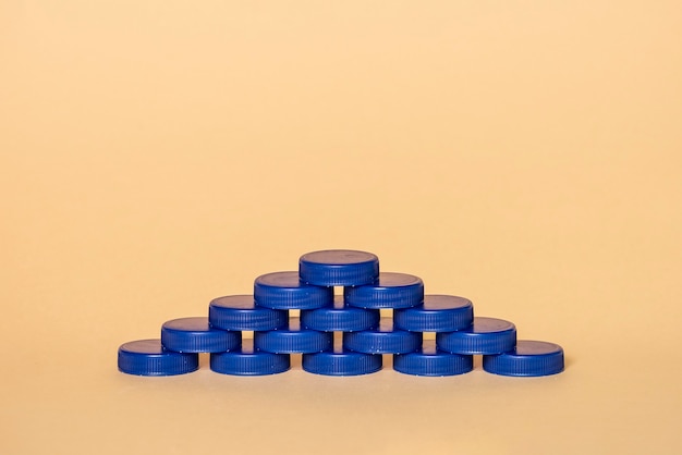 Pyramid-shaped blue plastic plugs