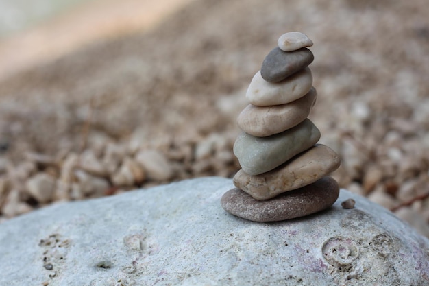 Pyramid of small stones on the seashore