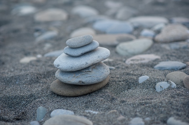 Pyramid of stones. Balanced Zen Stones.