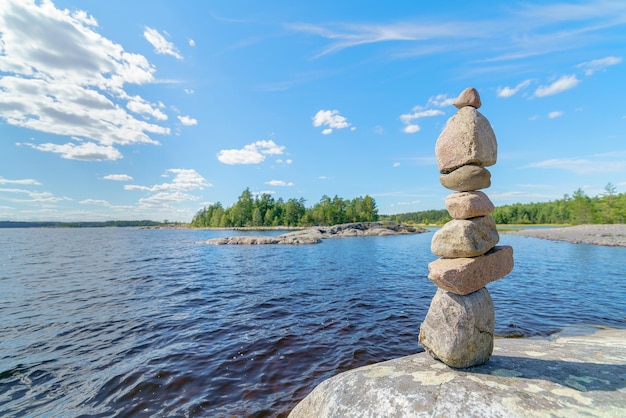 Pyramid of stones Unstable balance of stone objects Idyllic state of nature