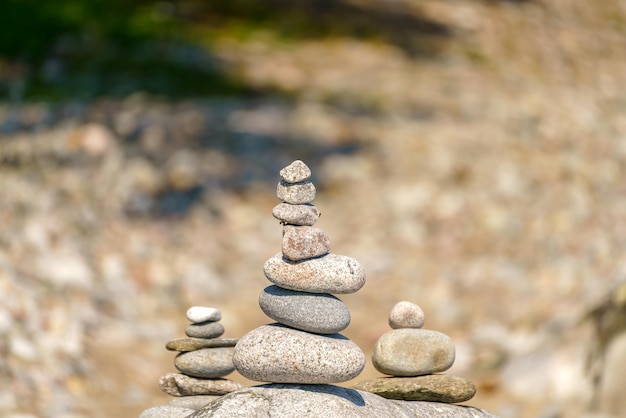 Pyramid of stones Unstable balance of stone objects Idyllic state of nature