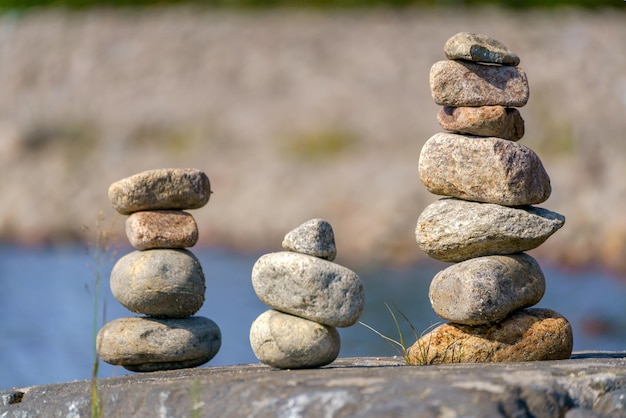 Pyramid of stones Unstable balance of stone objects Idyllic state of nature