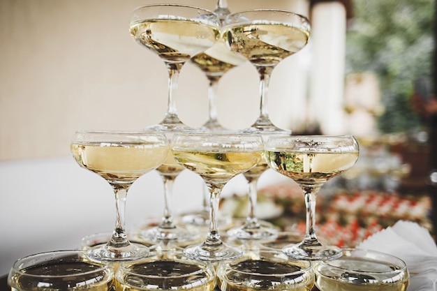 Pyramid of wine glasses at the festival. wedding or new year