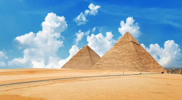 Pyramids of Giza in the desert by day