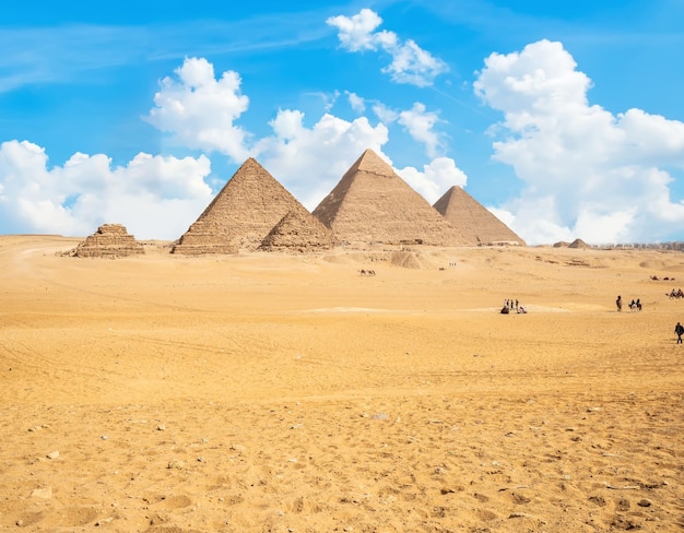 Pyramids of Giza in the desert by day