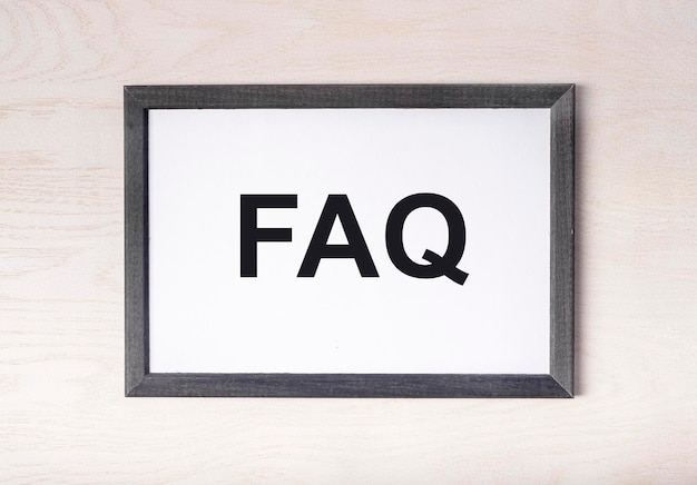 Q and a concept faq acronym on paper in frame