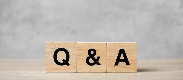 Q and A word with wooden block. FAQ( frequency asked questions), Answer, Question  Ask, Information, Communication and Brainstorming Concepts