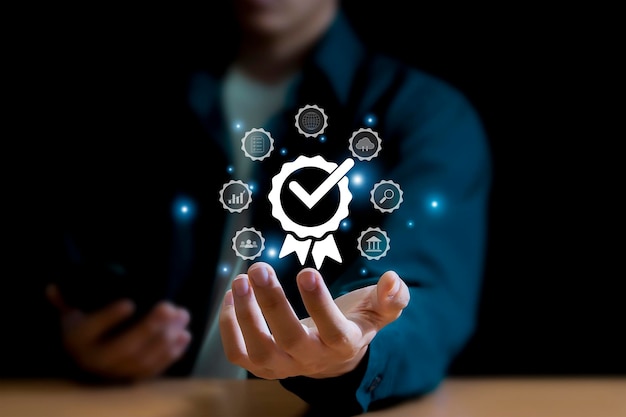 qa businessman qa symbol showing quality assurance on virtual screen