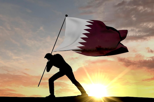 Qatar flag being pushed into the ground by a male silhouette 3D Rendering