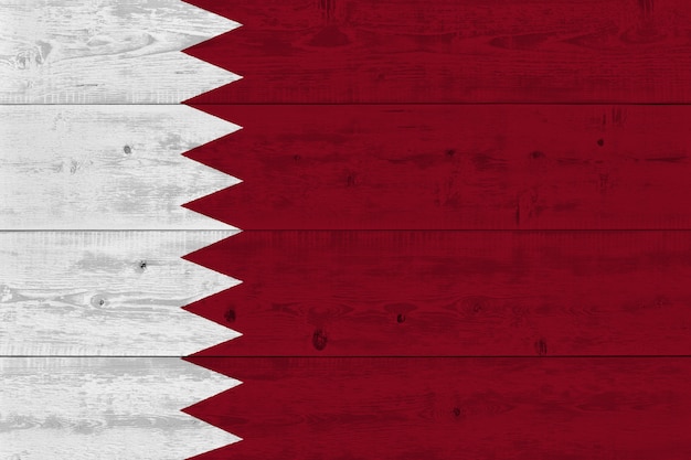 Qatar flag painted on old wood plank