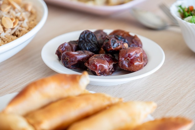 Qatayef and dates on ramadan dining table for iftar