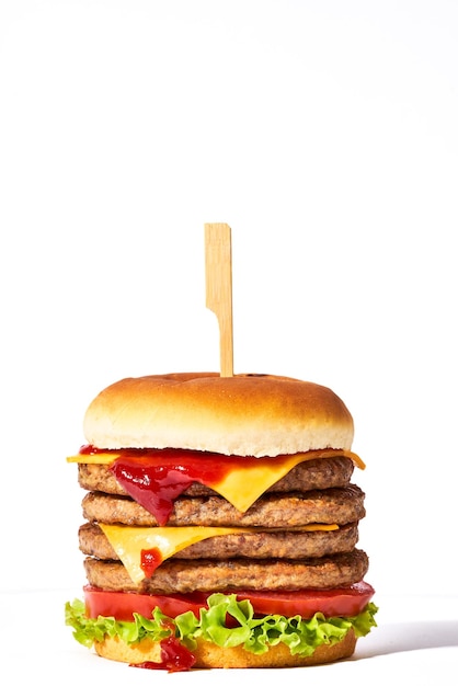 Photo quadruple meat burger isolated on white background