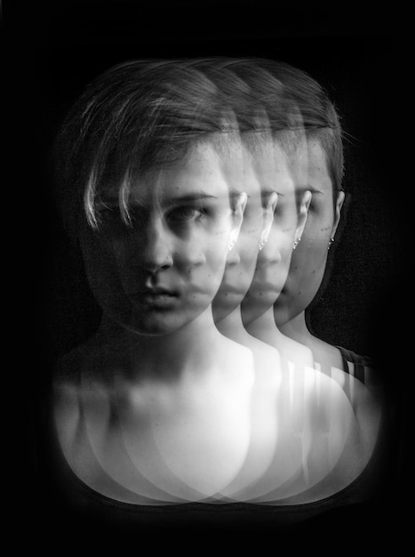 Photo quadruple portrait of a girl with short hair on black background