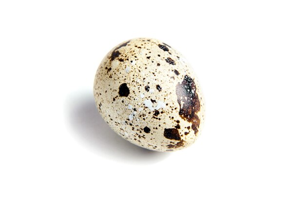 Quail egg isolated on a white background