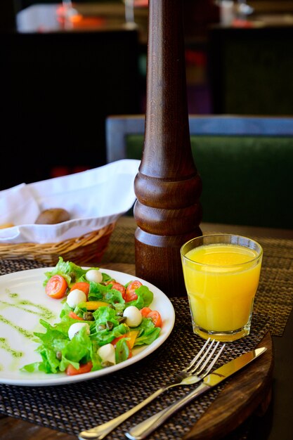 Quail Egg Salad with Lettuce and Tomatoes on a Plate